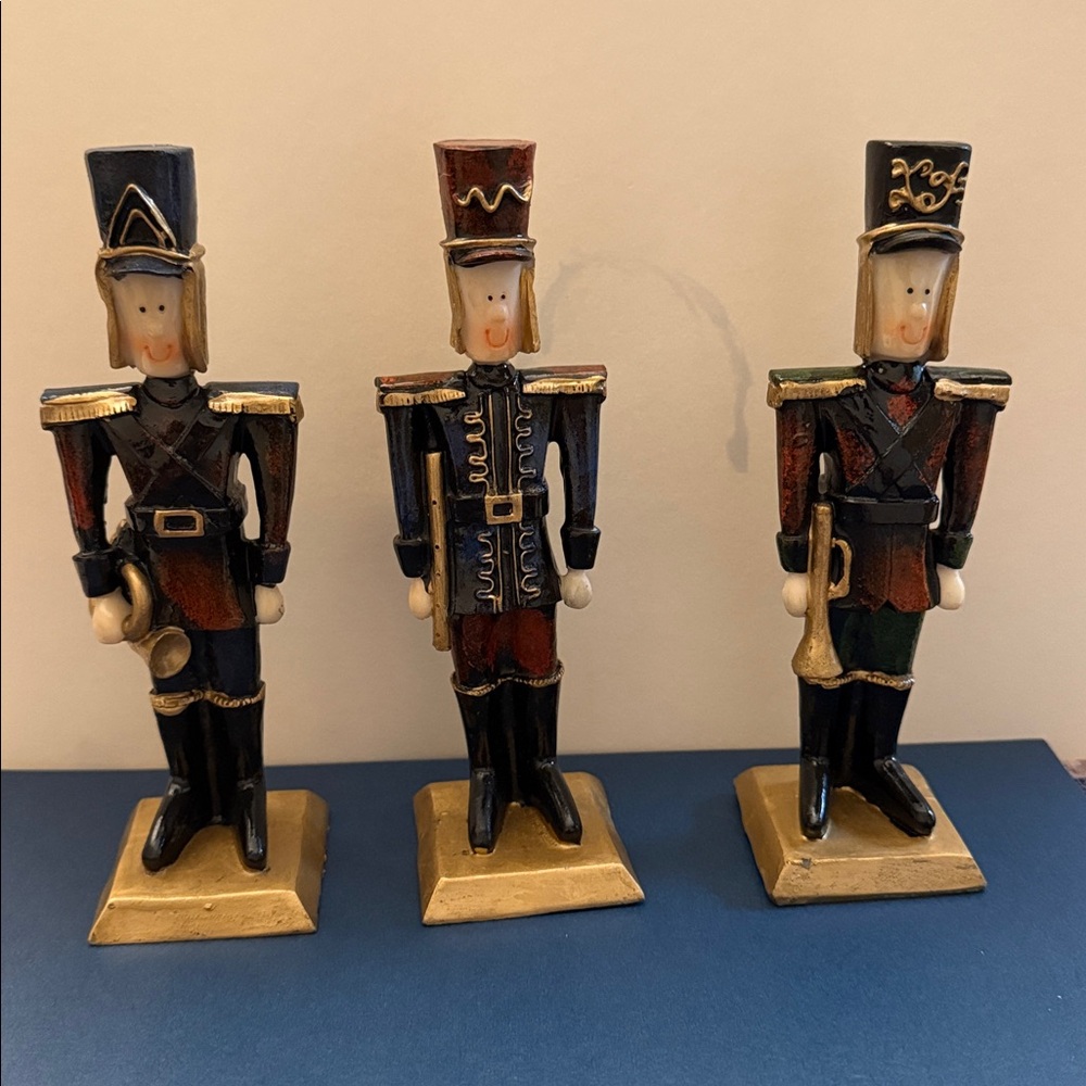 Set of Three Nutcracker Figurines. Hand painted ceramic